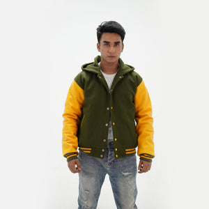 Detailed view of green and yellow hooded coach jacket combining classic varsity tradition with modern hooded design