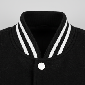 Black jacket with white striped collar on a gray background