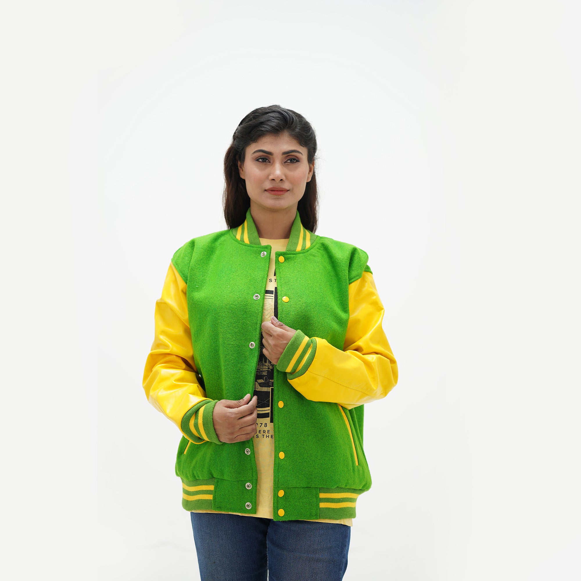 Kelly green letterman jacket women side angle - showcasing bold green wool body with leather arms and coordinating ribbed cuffs