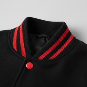 Black jacket with red stripes on the collar against a gray background
