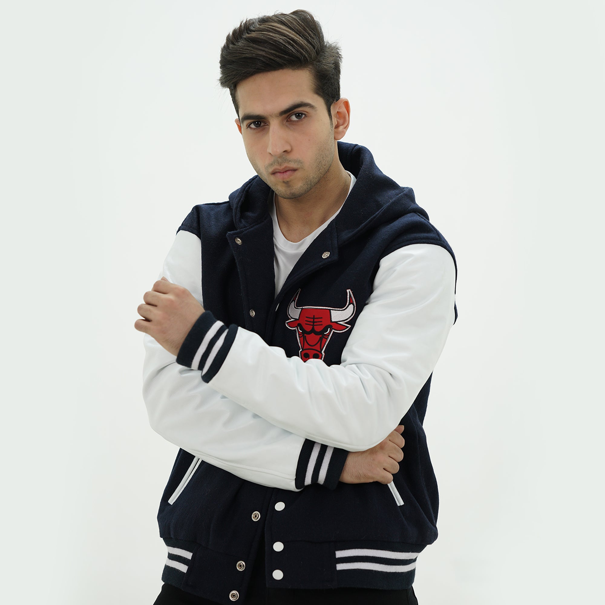Side angle of men Chicago Bulls hoodie jacket showcasing leather arms and wool body with attached hood for extra warmth
