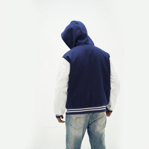 Back view of men's navy blue varsity jacket with hood showing premium Melton wool construction and stand-up collar