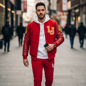 Man wearing a red varsity jacket with 'LJ' lettering on a city street.