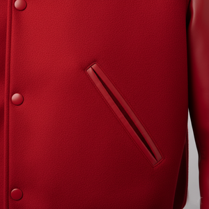 Close-up of a red jacket with a pocket and buttons on a light gray background