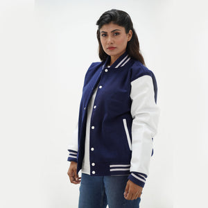 Navy blue varsity jacket women detail shot - premium Melton wool texture with leather sleeve construction and quality stitching