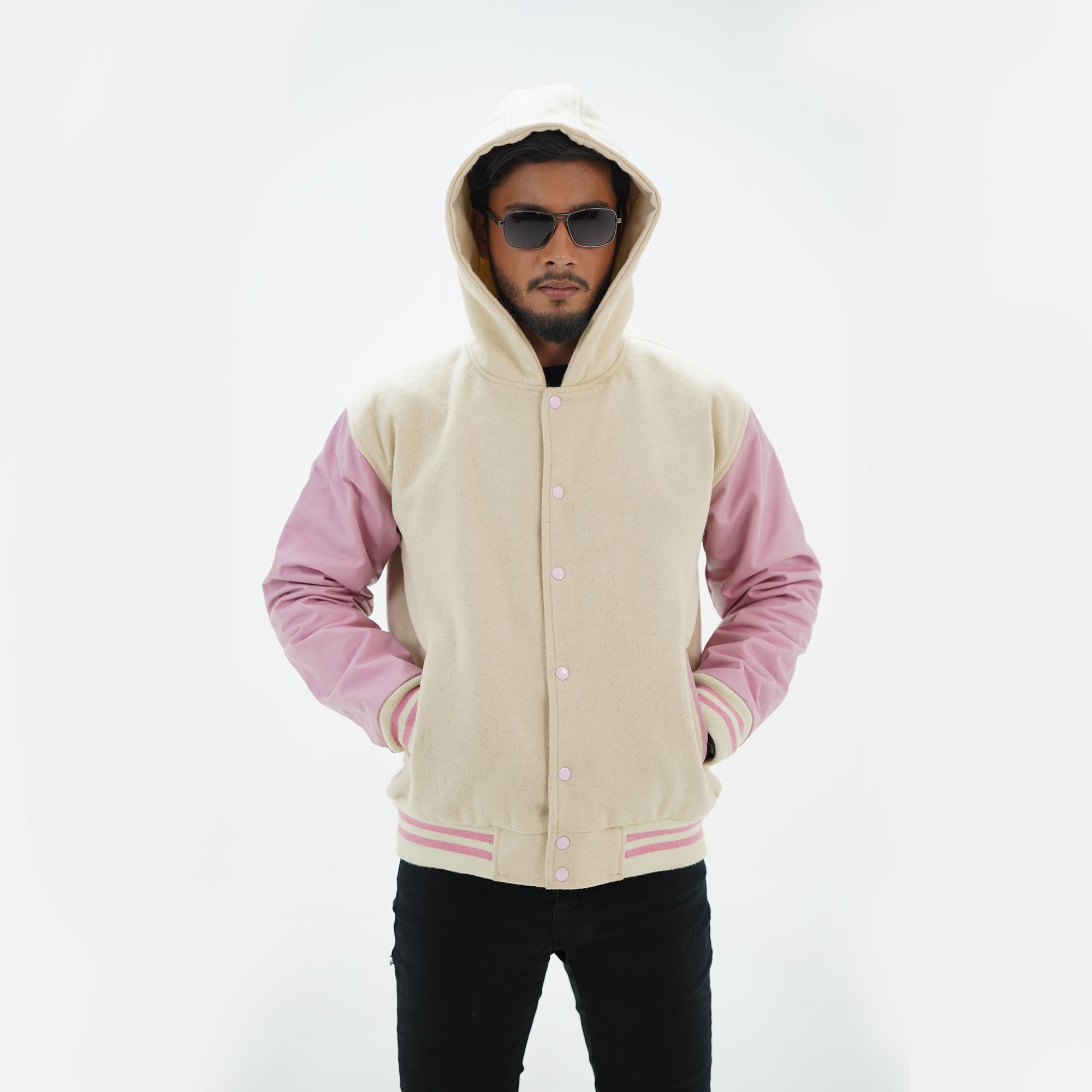 Detailed view of off white and pink varsity hoodie jacket making bold fashion statement with premium materials