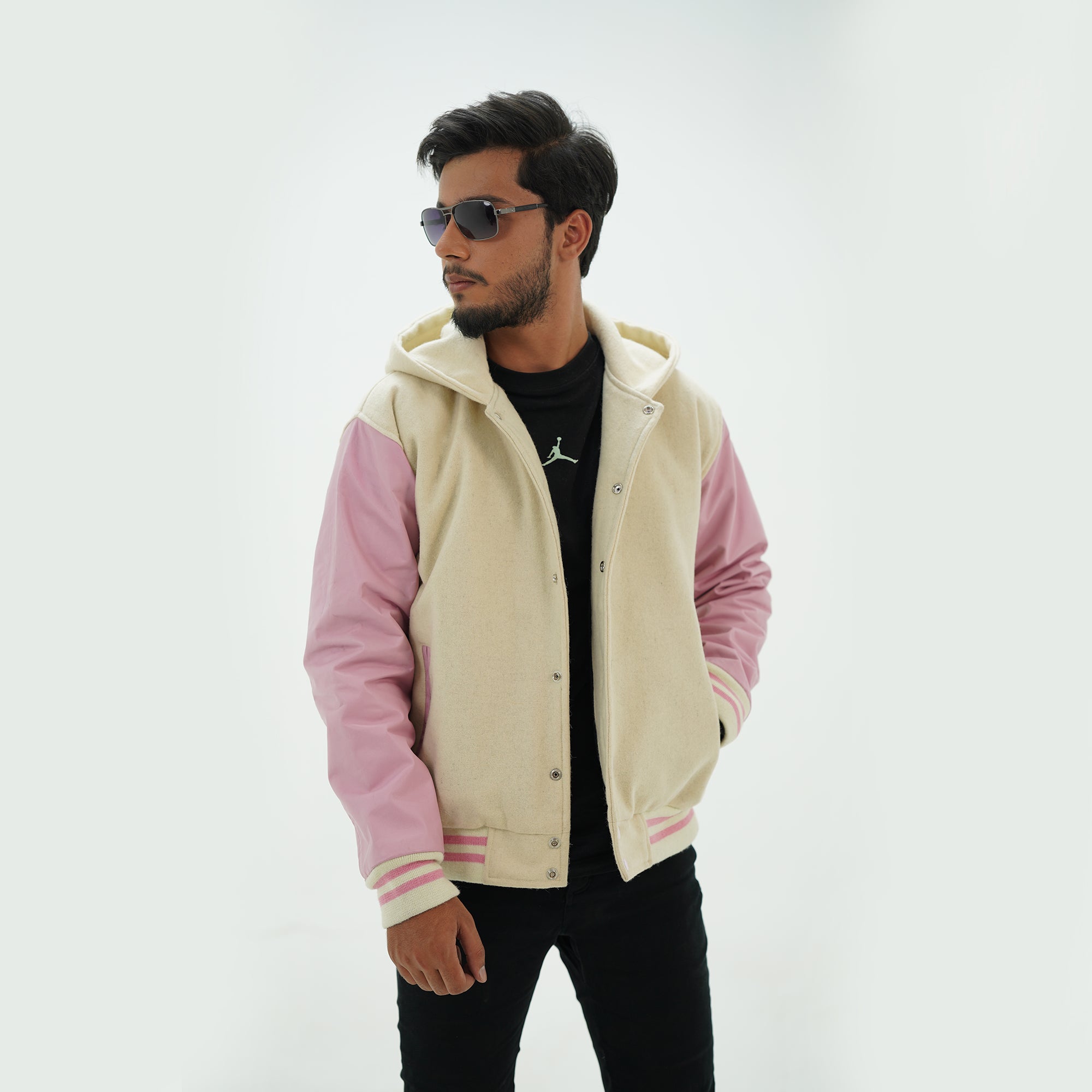 Off white and pink varsity jacket hoodie showcasing modern hooded design with classic varsity tradition styling