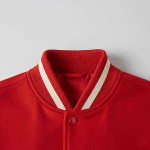 Red jacket with a white stripe on the collar against a light gray background
