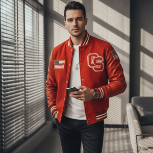 Man wearing a red varsity jacket with American flags and a letter 'OS' emblem, holding a phone.