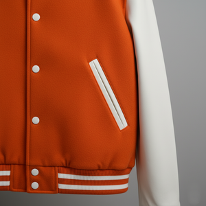 Orange varsity jacket with white accents on a gray background