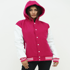 Side profile of girls pink varsity hoodie featuring white leather raglan sleeves and striped ribbed cuffs with drawstring hood