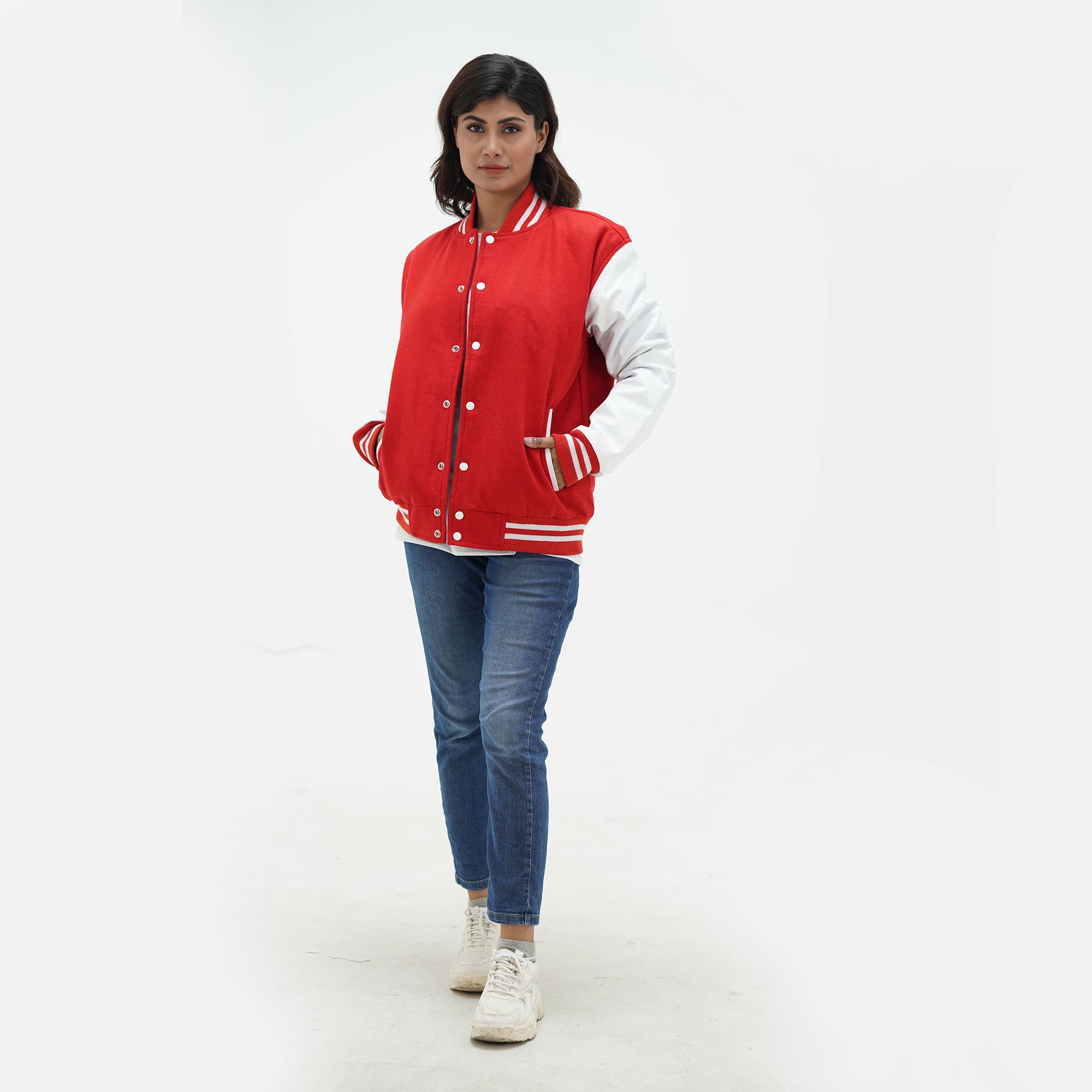 Red athletic jacket women close-up - showing ribbed collar construction with red and white striped trim and snap button hardware