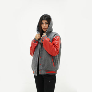 Close-up of ribbed collar and snap button placket on red and gray varsity jacket with white leather sleeve trim