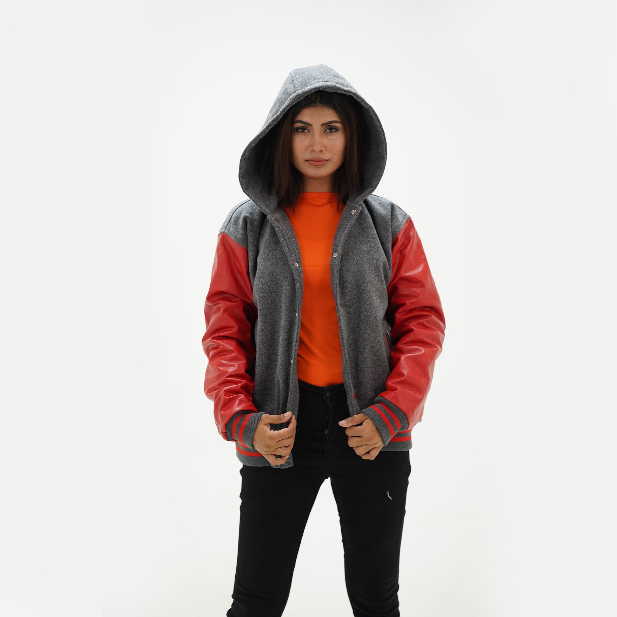 Red and gray varsity jacket ribbed waistband and hem with striped knit trim showing wool to leather construction