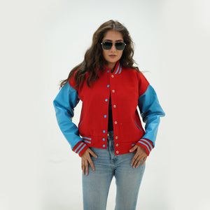 Alternate angle of red and sky blue letterman jacket for women showcasing premium wool-leather construction and ribbed trim details