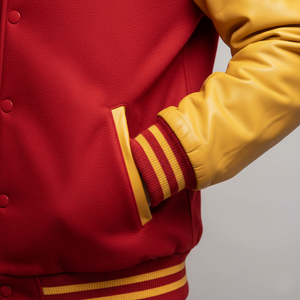 Red and yellow varsity jacket with a gray background
