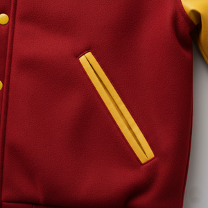 Red jacket with a yellow pocket and button on a light gray background