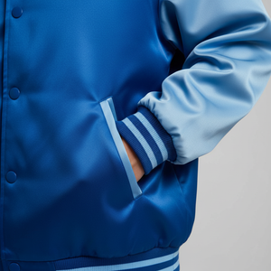 Side angle of satin varsity jacket highlighting polished appearance and eye-catching shiny finish for streetwear style 