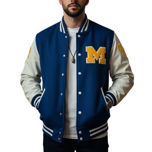a student wearing university of Michigan's varsity jacket, big M patch on front left panel