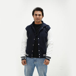Close-up detail of dark blue and white varsity jacket with hood wool body and leather sleeves premium quality materials