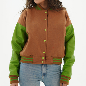 Varsity jacket women brown and parrot green front view with brown wool body, parrot green leather sleeves, snap button closure, and ribbed collar
