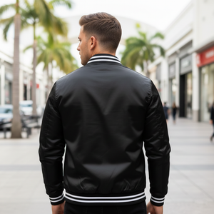 Back view of varsity windbreaker jacket showing durable construction and lightweight design