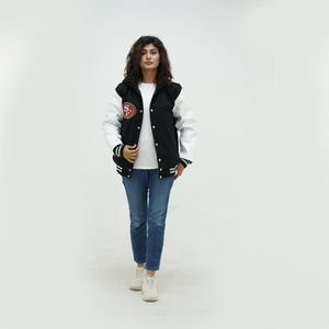 full view of women 49ers hooded varsity jacket highlighting attached hood and premium navy wool white leather construction for ladies