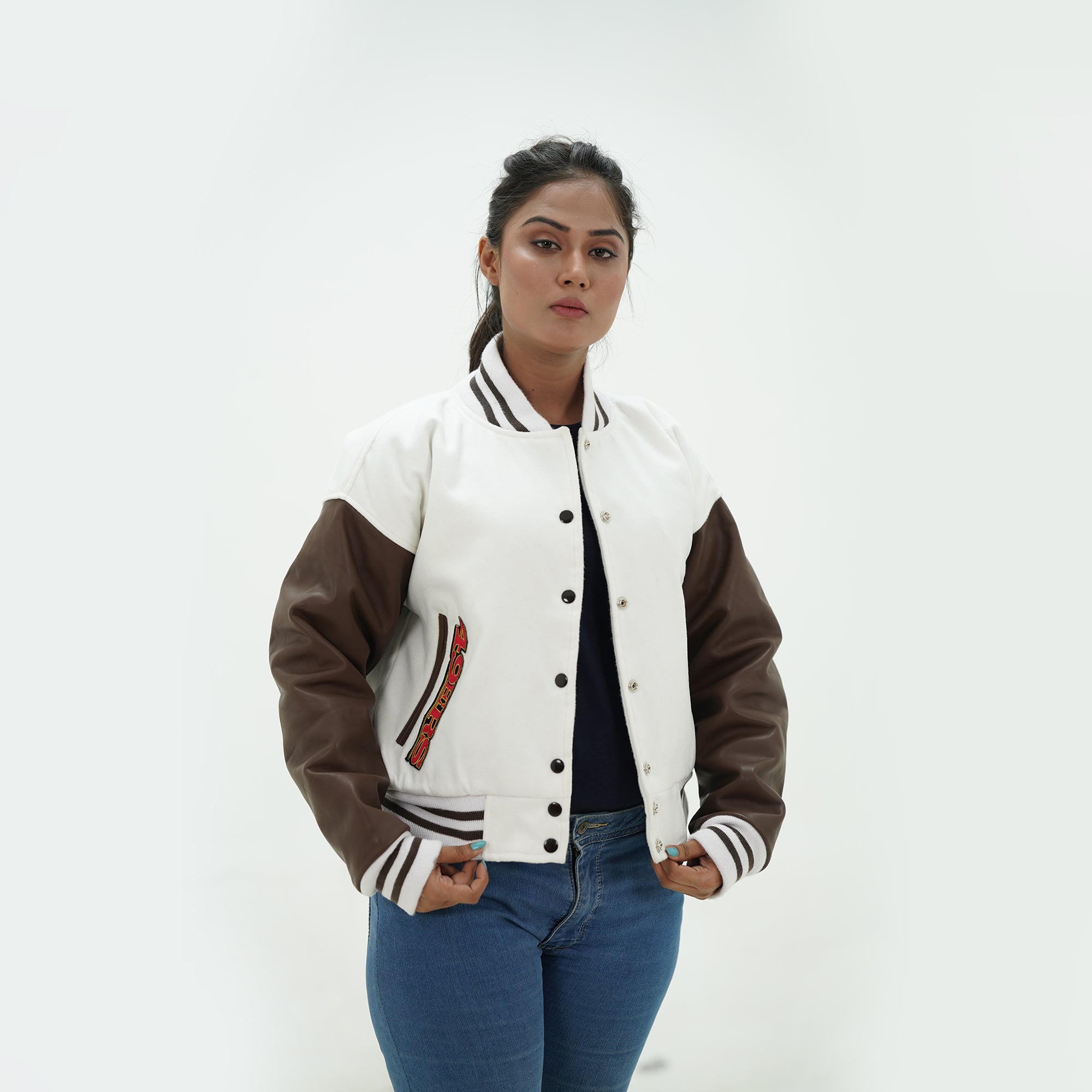 Side profile of women 49ers varsity jacket showcasing chocolate leather arms and premium wool body for female football fans