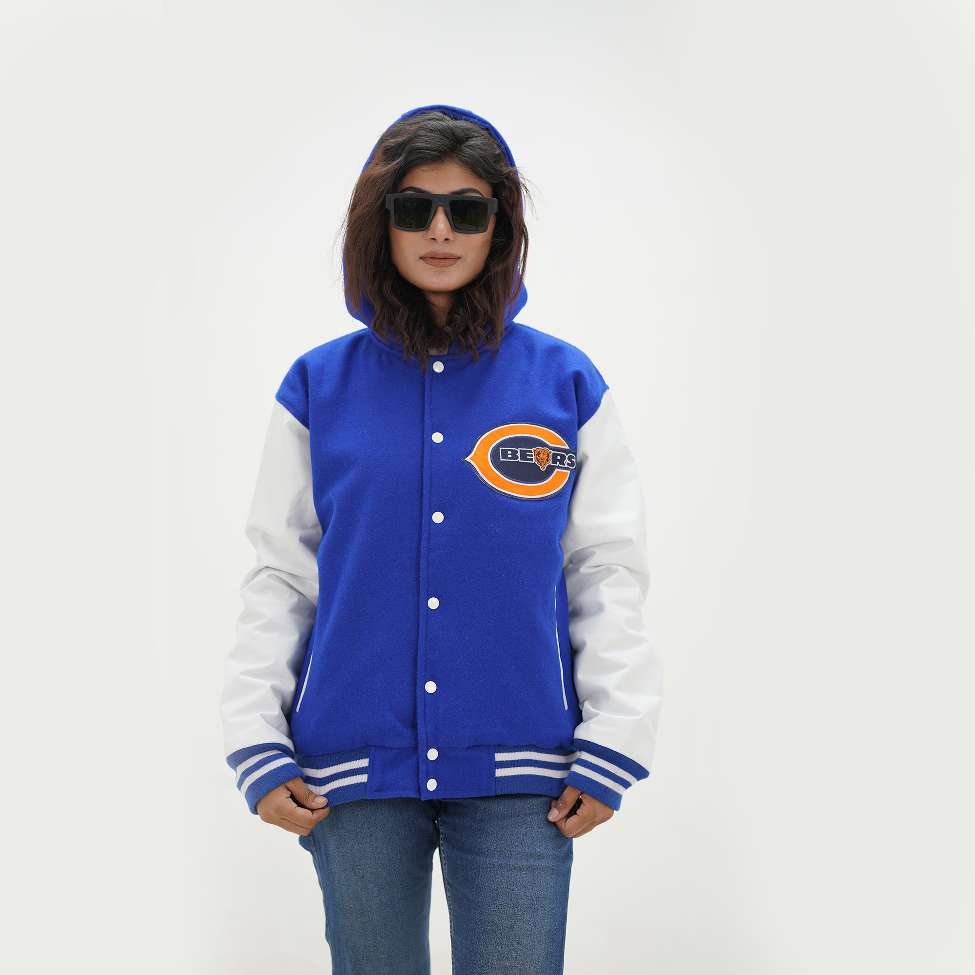 Three quarter angle of women Bears varsity hoodie showing tailored design with royal wool body and white leather arms for female fans