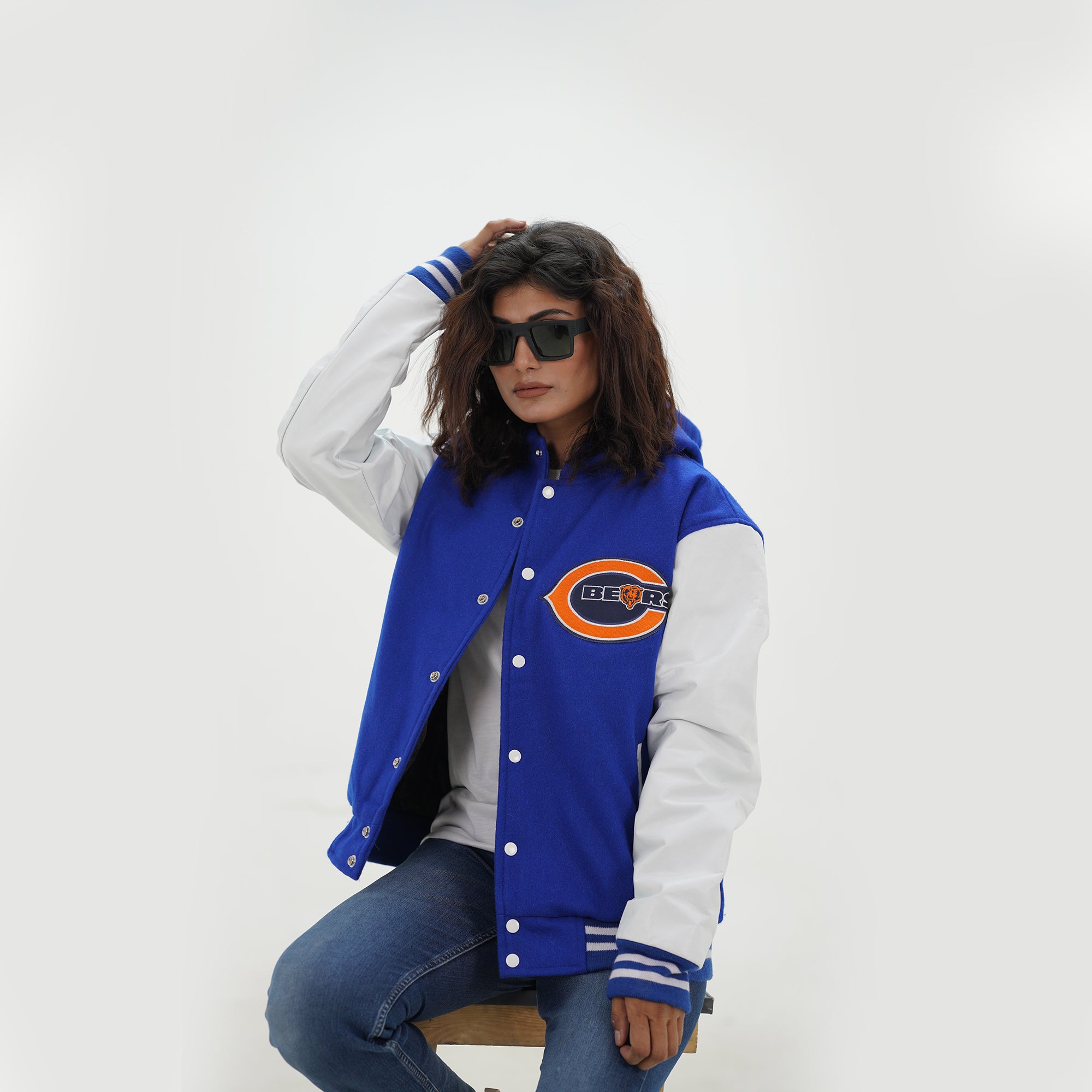 Detail shot of women Chicago Bears letterman hoodie showing premium quality wool and genuine leather construction with hood for NFL wear