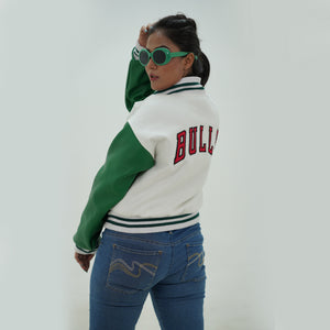 Back view of women Chicago Bulls varsity jacket highlighting tailored women fit and premium construction for game day style