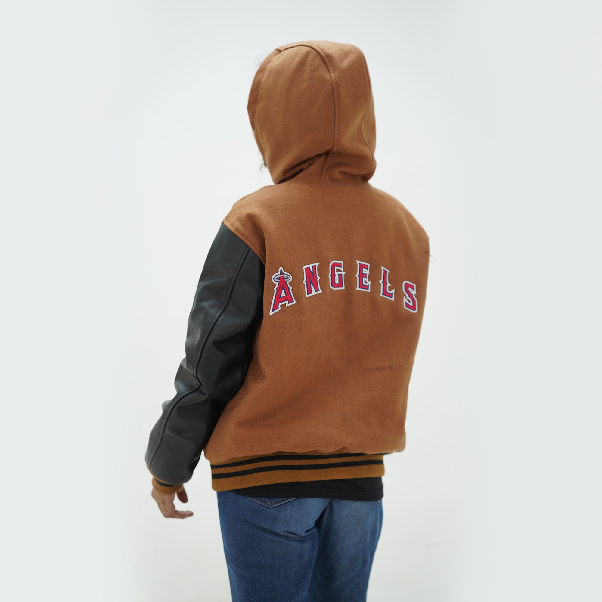 Back view of women LA varsity hoodie showing attached hood styling and authentic wool leather construction for female Los Angeles fans