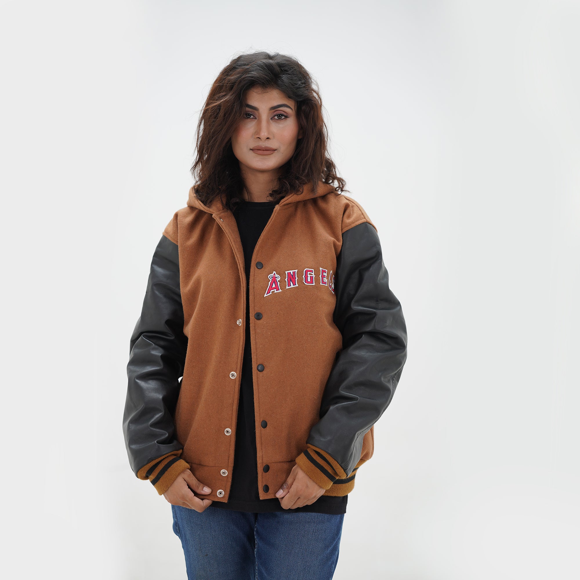 Three quarter view of women Los Angeles hooded jacket highlighting premium wool and leather materials with tailored women fit
