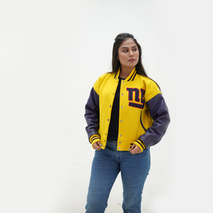 Close up of women NY Giants varsity jacket ribbed trim collar and cuffs with yellow wool purple leather detailing for authentic styling