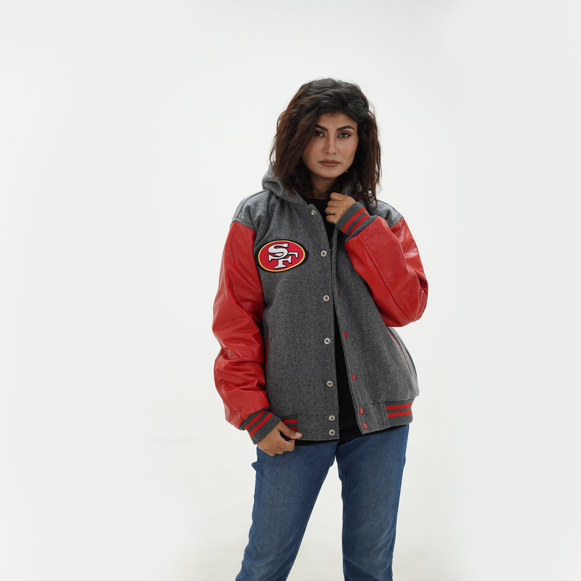 Three quarter view of women San Francisco hooded jacket highlighting premium wool body and genuine red leather sleeve construction