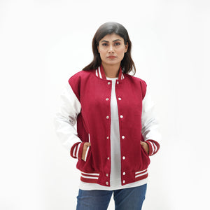 Women's magenta and white wool leather jacket full body fit - featuring bold magenta body, white leather arms, side pockets, and classic ribbed waistband