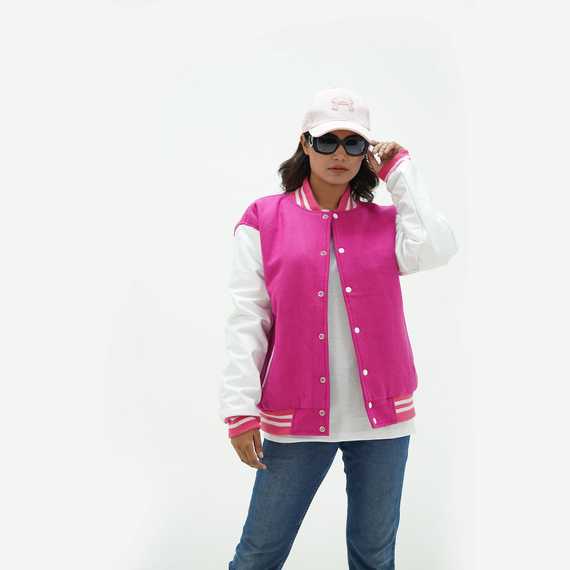 Women's pink athletic jacket full body fit - tailored feminine silhouette with leather arms, side pockets, and classic ribbed waistband