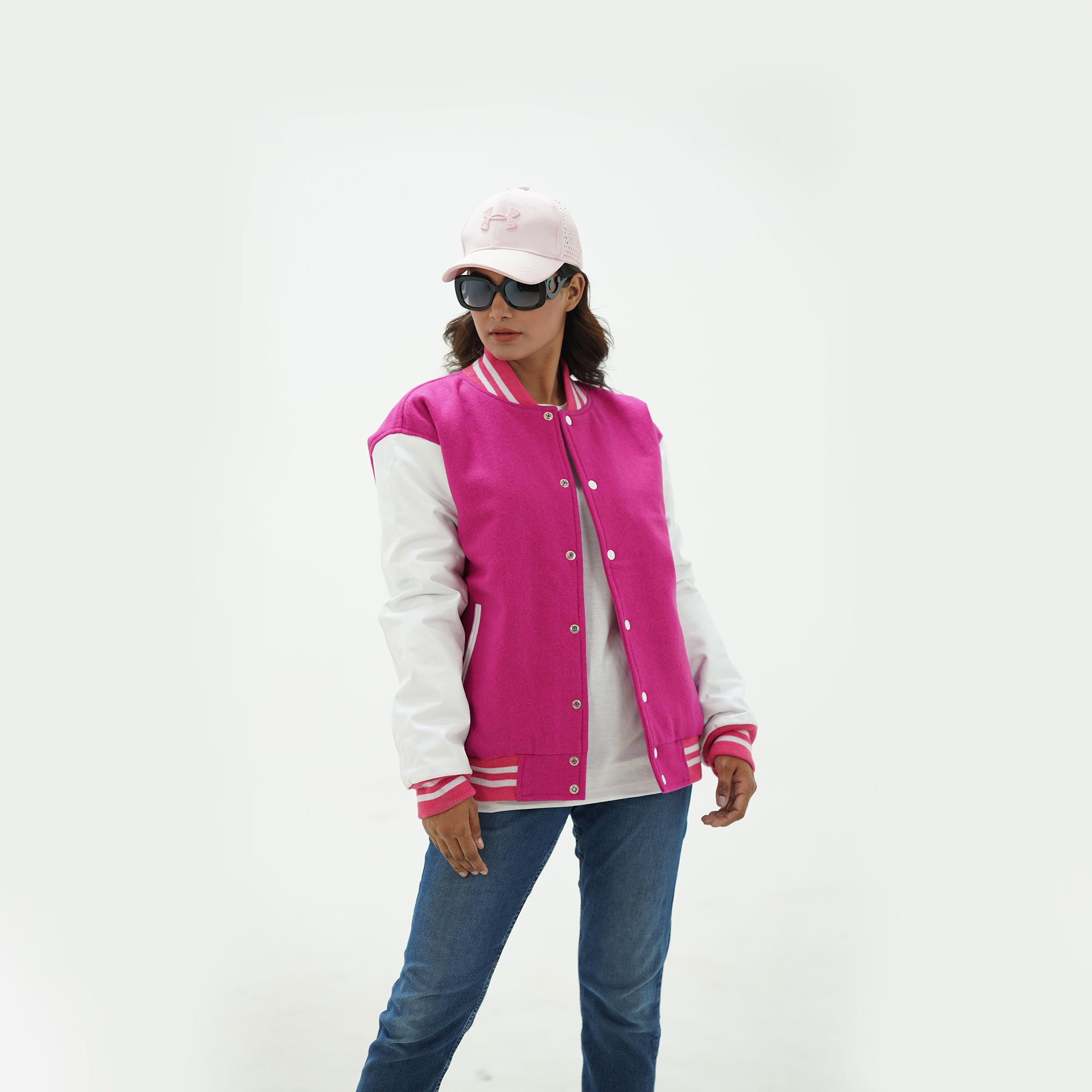 Women's pink wool varsity jacket back view - featuring pink Melton wool body with leather sleeves and ribbed hem construction