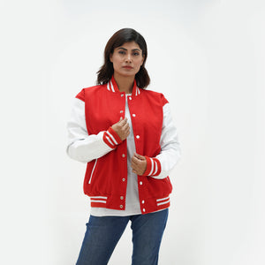 Women's red and white wool leather jacket full body fit - featuring bold red body, white leather arms, side pockets, and classic ribbed waistband